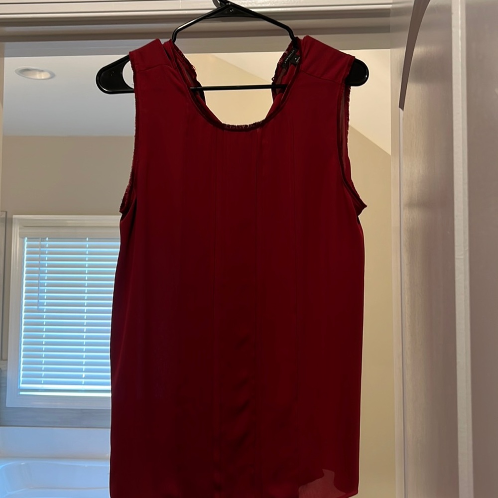 Red work blouse with frayed trim